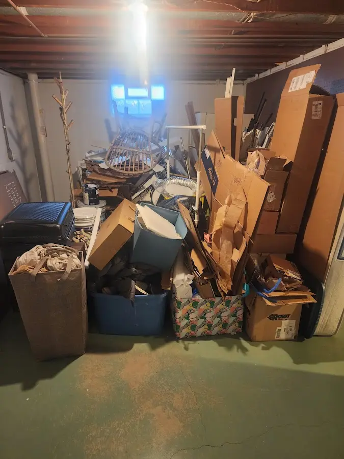 Roll-off dumpster container at job site for 20 Yard Dumpster Rental in Cornville